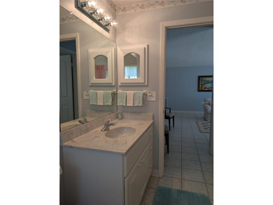 Immaculate *PHILODENDRON* w/private backyard, centrally located on Mainlands Golf Club in Florida - for sale on GolfHomes.com, golf home, golf lot