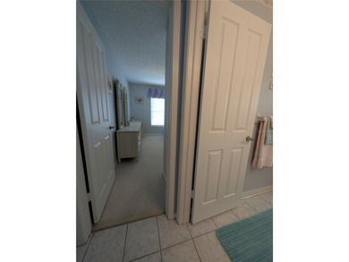 Immaculate *PHILODENDRON* w/private backyard, centrally located on Mainlands Golf Club in Florida - for sale on GolfHomes.com, golf home, golf lot