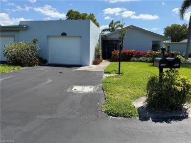 This 2 bedroom, 2 bathroom villa w/garage features an updated on The Glades Golf and Country Club in Florida - for sale on GolfHomes.com, golf home, golf lot