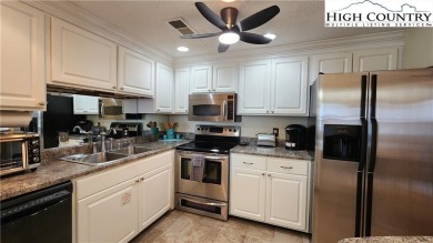 Perched on the 10th floor of Sugar Top, this spacious 2-bedroom on Sugar Mountain Golf Course in North Carolina - for sale on GolfHomes.com, golf home, golf lot