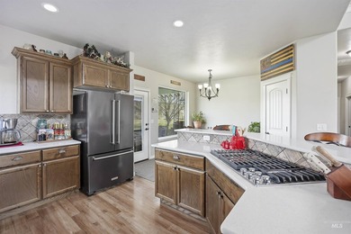 Golf course living with a massive RV garage and breathtaking on Clear Lake Country Club in Idaho - for sale on GolfHomes.com, golf home, golf lot