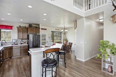 Golf course living with a massive RV garage and breathtaking on Clear Lake Country Club in Idaho - for sale on GolfHomes.com, golf home, golf lot