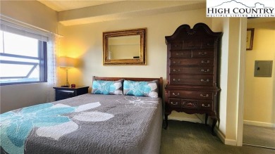 Perched on the 10th floor of Sugar Top, this spacious 2-bedroom on Sugar Mountain Golf Course in North Carolina - for sale on GolfHomes.com, golf home, golf lot