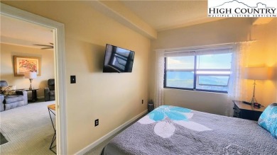 Perched on the 10th floor of Sugar Top, this spacious 2-bedroom on Sugar Mountain Golf Course in North Carolina - for sale on GolfHomes.com, golf home, golf lot