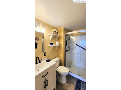 Perched on the 10th floor of Sugar Top, this spacious 2-bedroom on Sugar Mountain Golf Course in North Carolina - for sale on GolfHomes.com, golf home, golf lot