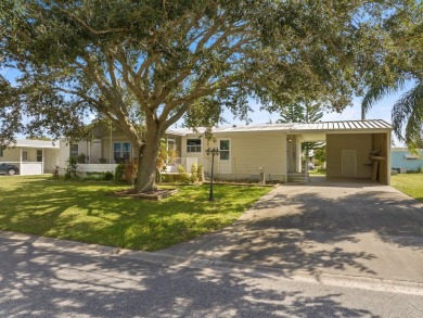 Rarely available large 3/2 + Den home featuring vaulted ceilings on Barefoot Bay Golf Course in Florida - for sale on GolfHomes.com, golf home, golf lot