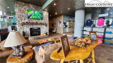 Perched on the 10th floor of Sugar Top, this spacious 2-bedroom on Sugar Mountain Golf Course in North Carolina - for sale on GolfHomes.com, golf home, golf lot