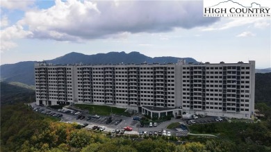 Perched on the 10th floor of Sugar Top, this spacious 2-bedroom on Sugar Mountain Golf Course in North Carolina - for sale on GolfHomes.com, golf home, golf lot