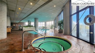 Perched on the 10th floor of Sugar Top, this spacious 2-bedroom on Sugar Mountain Golf Course in North Carolina - for sale on GolfHomes.com, golf home, golf lot