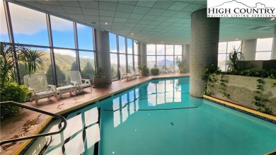 Perched on the 10th floor of Sugar Top, this spacious 2-bedroom on Sugar Mountain Golf Course in North Carolina - for sale on GolfHomes.com, golf home, golf lot