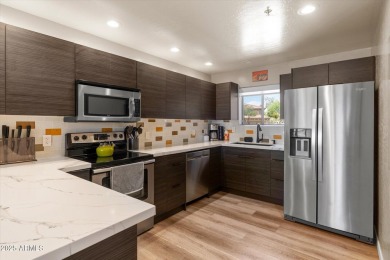 This beautifully updated first-floor condo blends timeless on Talon at Grayhawk Golf Course in Arizona - for sale on GolfHomes.com, golf home, golf lot
