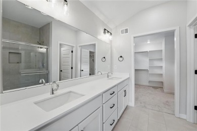 This bright and comfortable three-bedroom, two-bathroom ranch on Golf Club of Creekmoor in Missouri - for sale on GolfHomes.com, golf home, golf lot