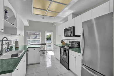 One or more photo(s) has been virtually staged. Step into this on Feather Sound Country Club in Florida - for sale on GolfHomes.com, golf home, golf lot