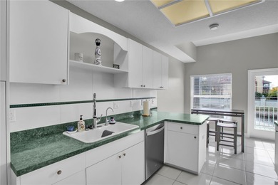 One or more photo(s) has been virtually staged. Step into this on Feather Sound Country Club in Florida - for sale on GolfHomes.com, golf home, golf lot