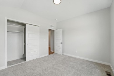 This bright and comfortable three-bedroom, two-bathroom ranch on Golf Club of Creekmoor in Missouri - for sale on GolfHomes.com, golf home, golf lot