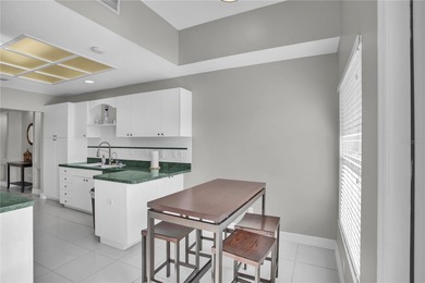 One or more photo(s) has been virtually staged. Step into this on Feather Sound Country Club in Florida - for sale on GolfHomes.com, golf home, golf lot