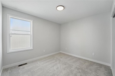 This bright and comfortable three-bedroom, two-bathroom ranch on Golf Club of Creekmoor in Missouri - for sale on GolfHomes.com, golf home, golf lot