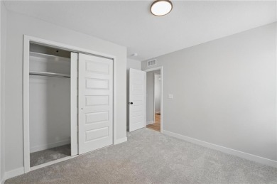 This bright and comfortable three-bedroom, two-bathroom ranch on Golf Club of Creekmoor in Missouri - for sale on GolfHomes.com, golf home, golf lot