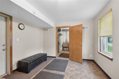 Prime location near Cedarholm Golf Course! This updated 2-bed on Roseville-Cedarholm Golf Club in Minnesota - for sale on GolfHomes.com, golf home, golf lot