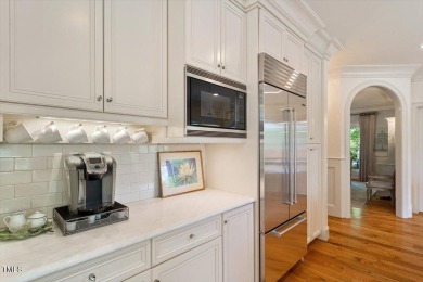 Step into timeless elegance at 801 Pinehurst Drive--a on Chapel Hill Country Club in North Carolina - for sale on GolfHomes.com, golf home, golf lot