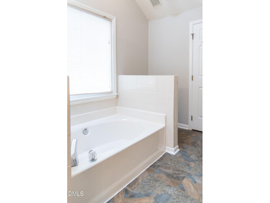 Nestled in the desirable Hedingham subdivision, this 3-bedroom on Hedingham Golf and Athletic Club in North Carolina - for sale on GolfHomes.com, golf home, golf lot