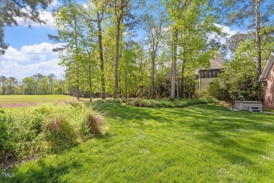Step into timeless elegance at 801 Pinehurst Drive--a on Chapel Hill Country Club in North Carolina - for sale on GolfHomes.com, golf home, golf lot