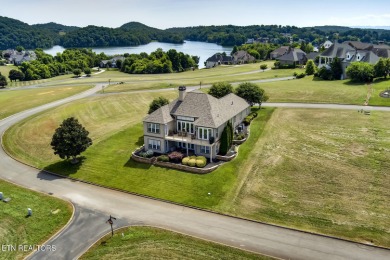 Move-in ready basement ranch with LAKE VIEWS located in serene on Rarity Bay Country Club - Loudon in Tennessee - for sale on GolfHomes.com, golf home, golf lot