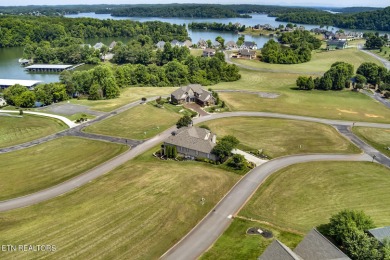 Move-in ready basement ranch with LAKE VIEWS located in serene on Rarity Bay Country Club - Loudon in Tennessee - for sale on GolfHomes.com, golf home, golf lot