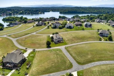 Move-in ready basement ranch with LAKE VIEWS located in serene on Rarity Bay Country Club - Loudon in Tennessee - for sale on GolfHomes.com, golf home, golf lot