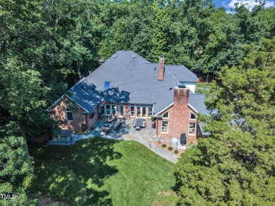 Step into timeless elegance at 801 Pinehurst Drive--a on Chapel Hill Country Club in North Carolina - for sale on GolfHomes.com, golf home, golf lot