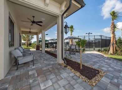 Welcome to resort-style living in the highly sought-after on Lakewood National Golf Club in Florida - for sale on GolfHomes.com, golf home, golf lot