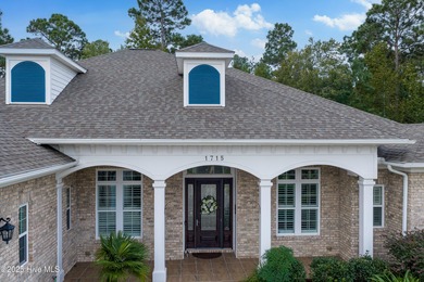 Located in the heart of Brunswick Forest and the prestigious on Cape Fear National At Brunswick Forest in North Carolina - for sale on GolfHomes.com, golf home, golf lot