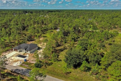 Exclusively listed by Sunland Real Estate: This prime 0.50-acre on Lehigh Resort Club in Florida - for sale on GolfHomes.com, golf home, golf lot