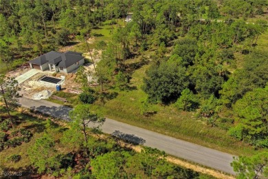Exclusively listed by Sunland Real Estate: This prime 0.50-acre on Lehigh Resort Club in Florida - for sale on GolfHomes.com, golf home, golf lot