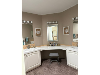 This 2001 Jacobsen fully furnished home offers 2 bedrooms, 2 on Sabal Springs Golf and Racquet Club in Florida - for sale on GolfHomes.com, golf home, golf lot