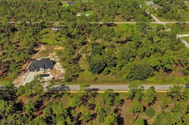 Exclusively listed by Sunland Real Estate: This prime 0.50-acre on Lehigh Resort Club in Florida - for sale on GolfHomes.com, golf home, golf lot