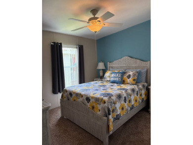 This 2001 Jacobsen fully furnished home offers 2 bedrooms, 2 on Sabal Springs Golf and Racquet Club in Florida - for sale on GolfHomes.com, golf home, golf lot