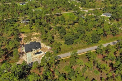 Exclusively listed by Sunland Real Estate: This prime 0.50-acre on Lehigh Resort Club in Florida - for sale on GolfHomes.com, golf home, golf lot