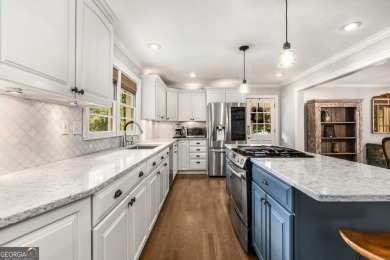 Nestled on a large 3/4+ acre serene, corner lot in the highly on Bobby Jones Golf Club in Georgia - for sale on GolfHomes.com, golf home, golf lot