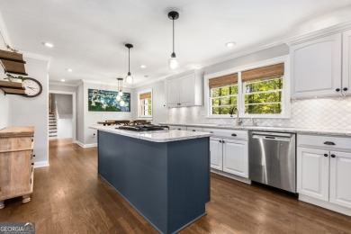 Nestled on a large 3/4+ acre serene, corner lot in the highly on Bobby Jones Golf Club in Georgia - for sale on GolfHomes.com, golf home, golf lot