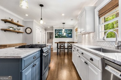 Nestled on a large 3/4+ acre serene, corner lot in the highly on Bobby Jones Golf Club in Georgia - for sale on GolfHomes.com, golf home, golf lot