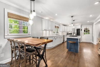 Nestled on a large 3/4+ acre serene, corner lot in the highly on Bobby Jones Golf Club in Georgia - for sale on GolfHomes.com, golf home, golf lot