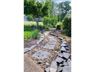 This beautiful brick home is both graciously proportioned and on Fords Colony Country Club in Virginia - for sale on GolfHomes.com, golf home, golf lot