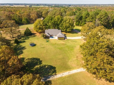 Situated on a stunning 3.5-acre corner lot directly across from on Somerville Country Club in Tennessee - for sale on GolfHomes.com, golf home, golf lot