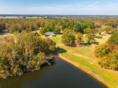 Situated on a stunning 3.5-acre corner lot directly across from on Somerville Country Club in Tennessee - for sale on GolfHomes.com, golf home, golf lot