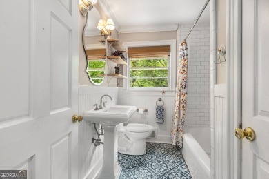 Nestled on a large 3/4+ acre serene, corner lot in the highly on Bobby Jones Golf Club in Georgia - for sale on GolfHomes.com, golf home, golf lot