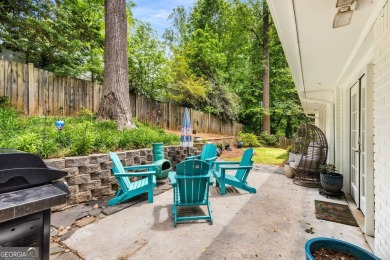 Nestled on a large 3/4+ acre serene, corner lot in the highly on Bobby Jones Golf Club in Georgia - for sale on GolfHomes.com, golf home, golf lot