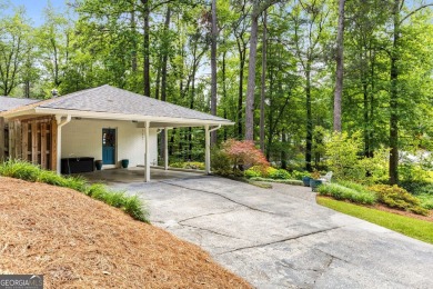 Nestled on a large 3/4+ acre serene, corner lot in the highly on Bobby Jones Golf Club in Georgia - for sale on GolfHomes.com, golf home, golf lot
