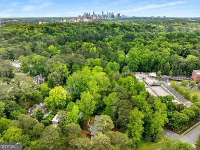 Nestled on a large 3/4+ acre serene, corner lot in the highly on Bobby Jones Golf Club in Georgia - for sale on GolfHomes.com, golf home, golf lot