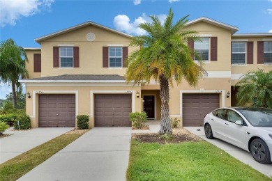 Welcome to 12952 Utopia Gardens Way - Tranquil Living with Water on Summerfield Crossing Golf Club in Florida - for sale on GolfHomes.com, golf home, golf lot